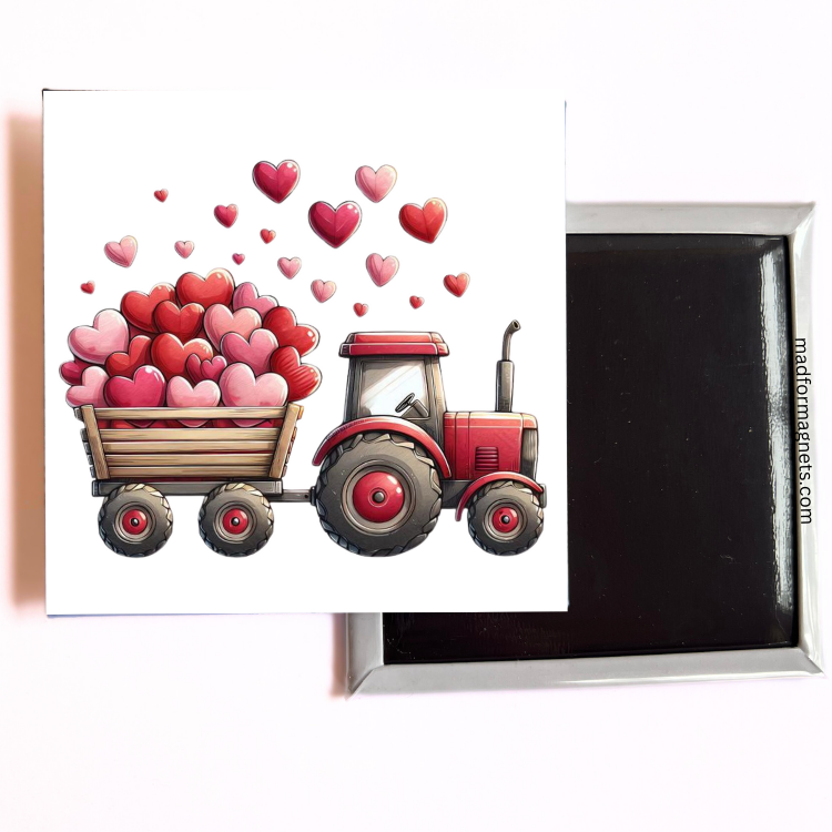 A red tractor hauling a wagon full of red and pink hearts for Valentine’s Day.